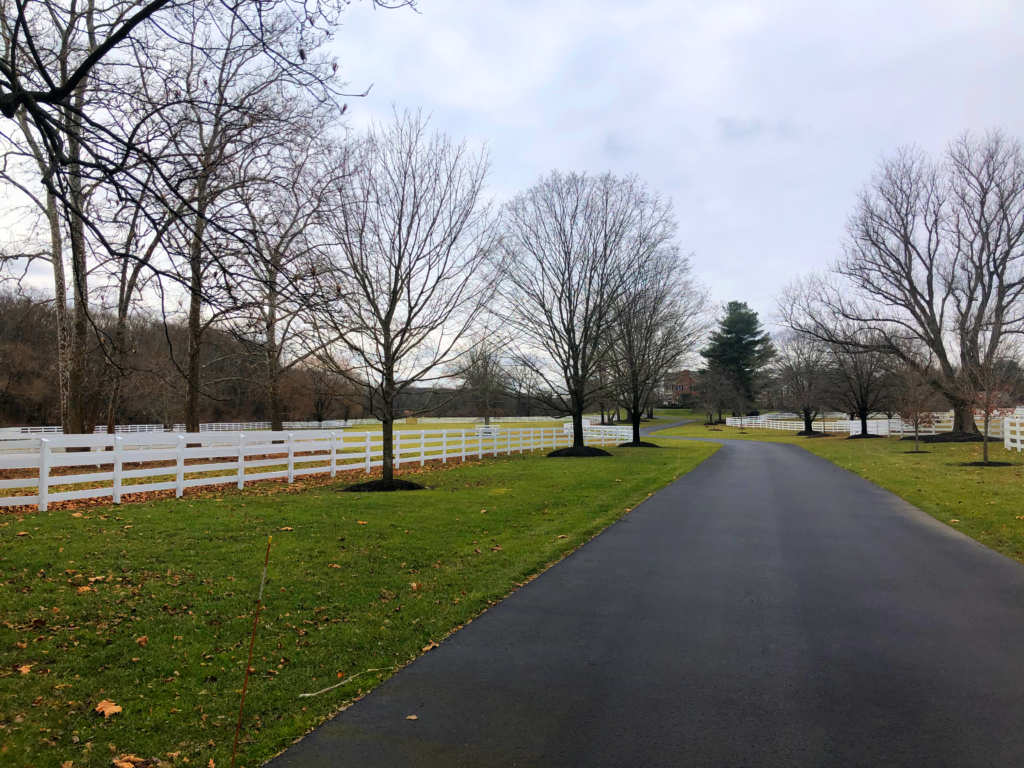 driveway with long white fence in new jersey